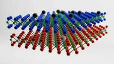 two layers of a chemical structure lie above each other with black balls hovering on top. On the top layer, there is a cyan ball with a white ball in the corresponding layer below